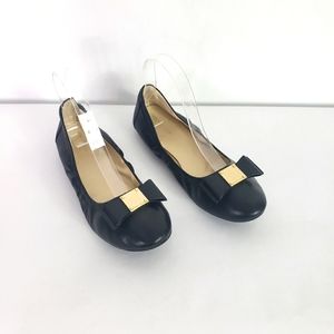 Cole Haan black ballet flat with front bow metal detail